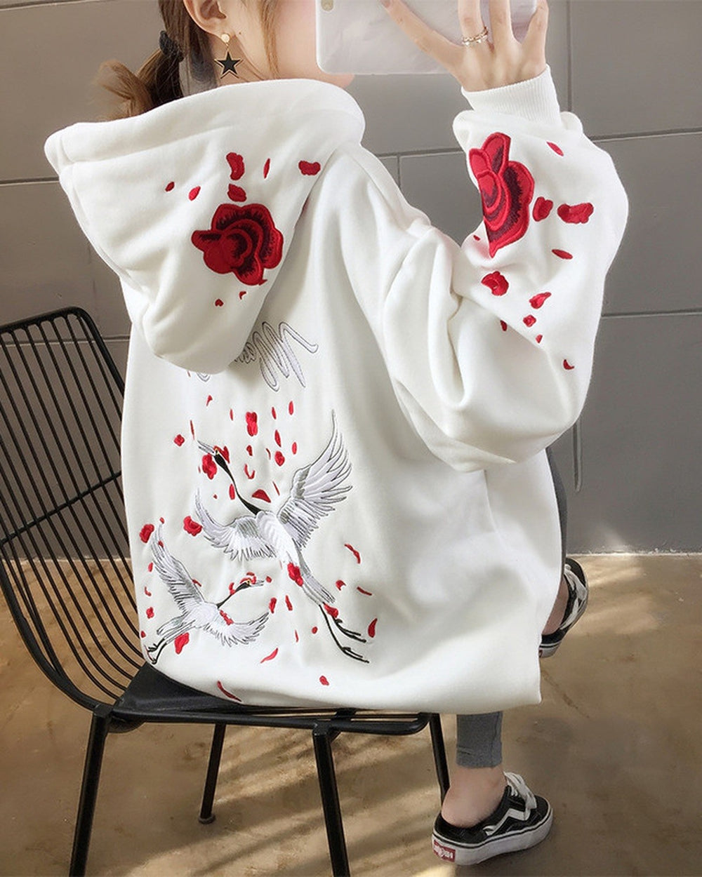 White loose hoodie, back view with embroidered cranes and roses on the hood