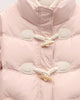 Close view of the two horn toggles on twisted cord loops and the chevron quilting on the pink jacket