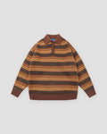 Knit polo sweater in mustard and brown zigzag stripes with a brown collar, front view