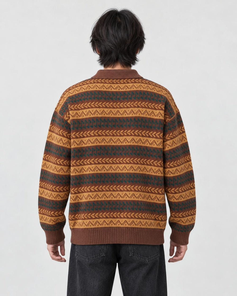 Model wearing the zigzag stripe knit polo sweater, back view
