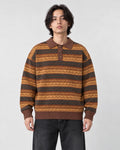 Model wearing the zigzag stripe knit polo sweater, front view