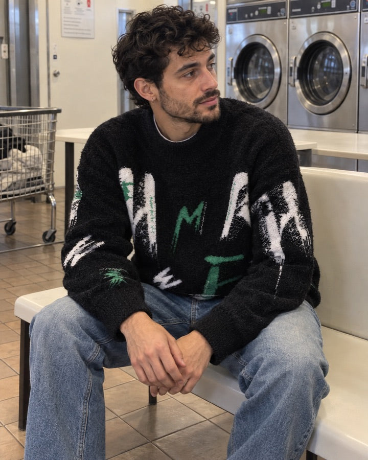 Brushstroke Letter Fuzzy Knit Sweater styled for an everyday setting.