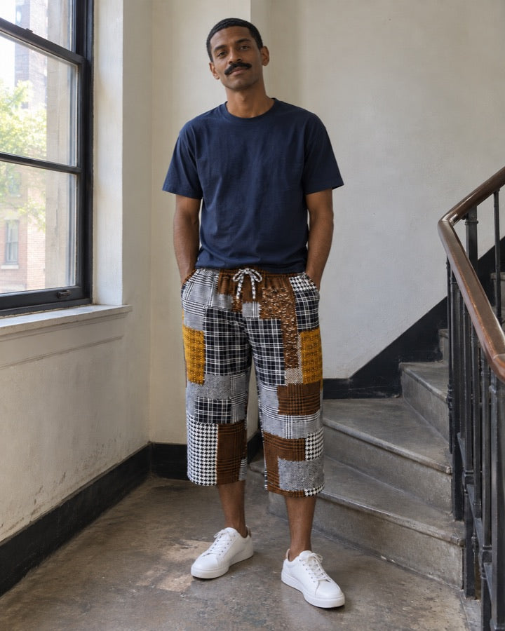 Men's Plaid Patchwork Cropped Pants with Drawcord styled for an everyday setting.
