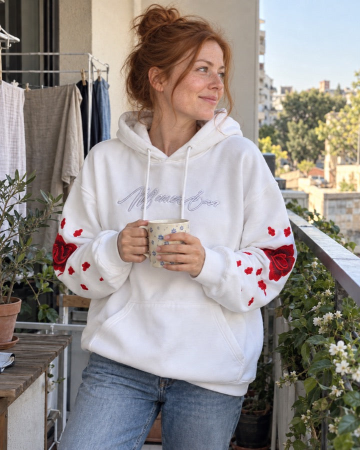 Women's Embroidered Rose and Crane Hoodie styled for an everyday setting.
